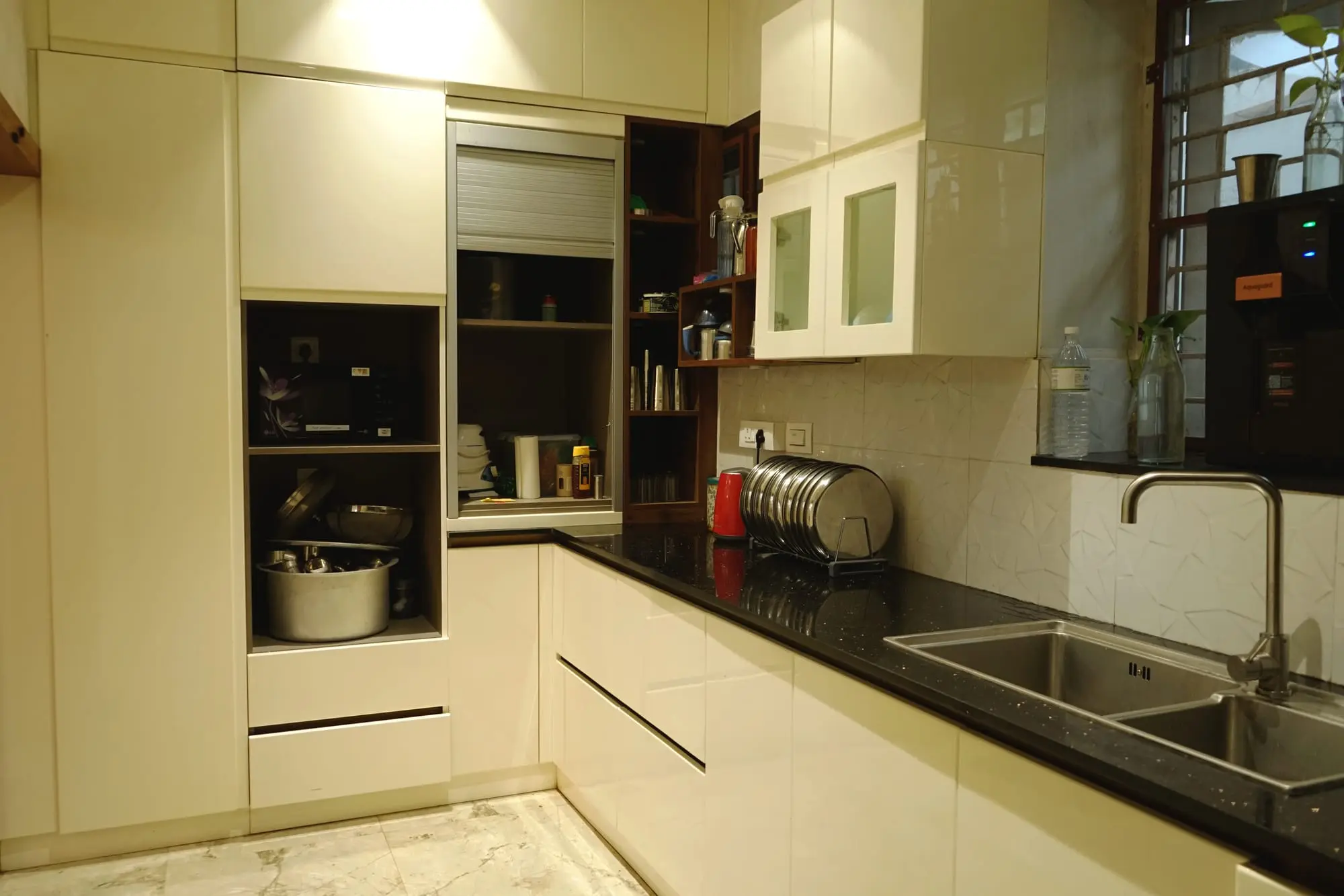 A microwave and a water purifier.