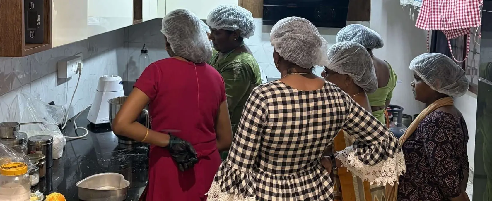 Community women learned to make plum cake