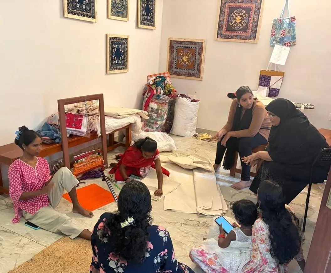 The stitching teacher trained while members watched and helped
