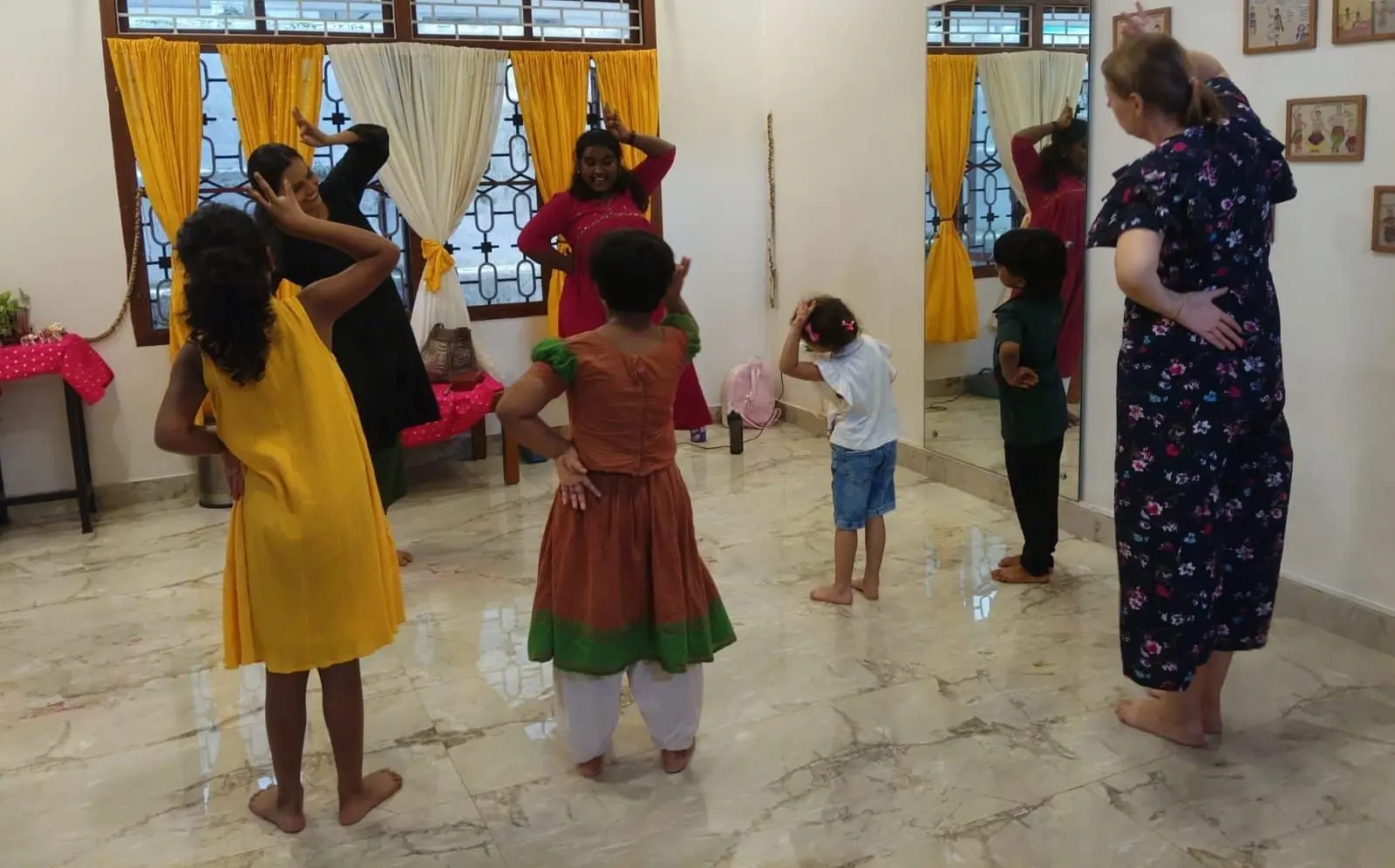 The kids' dance class worked on new steps