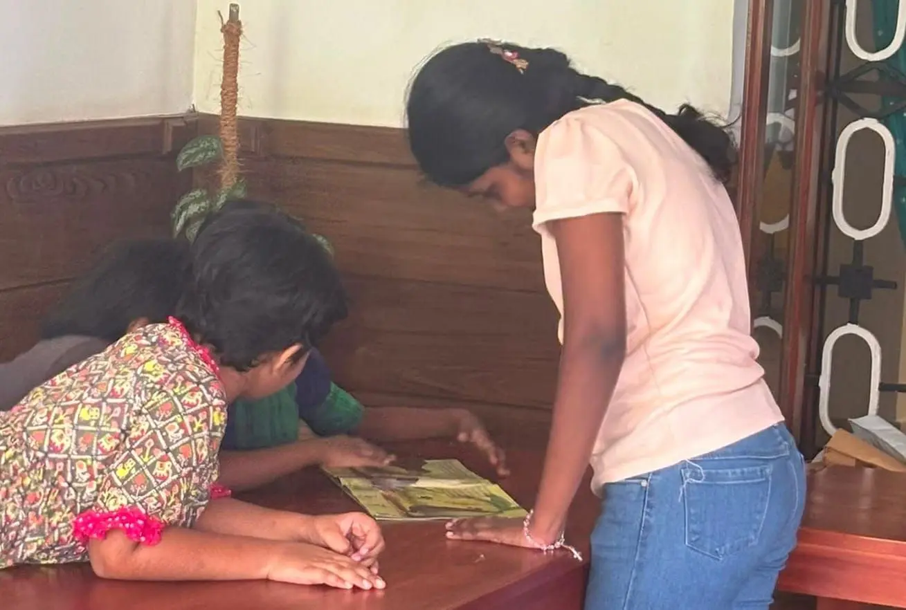 The Reading Club split into small reading groups