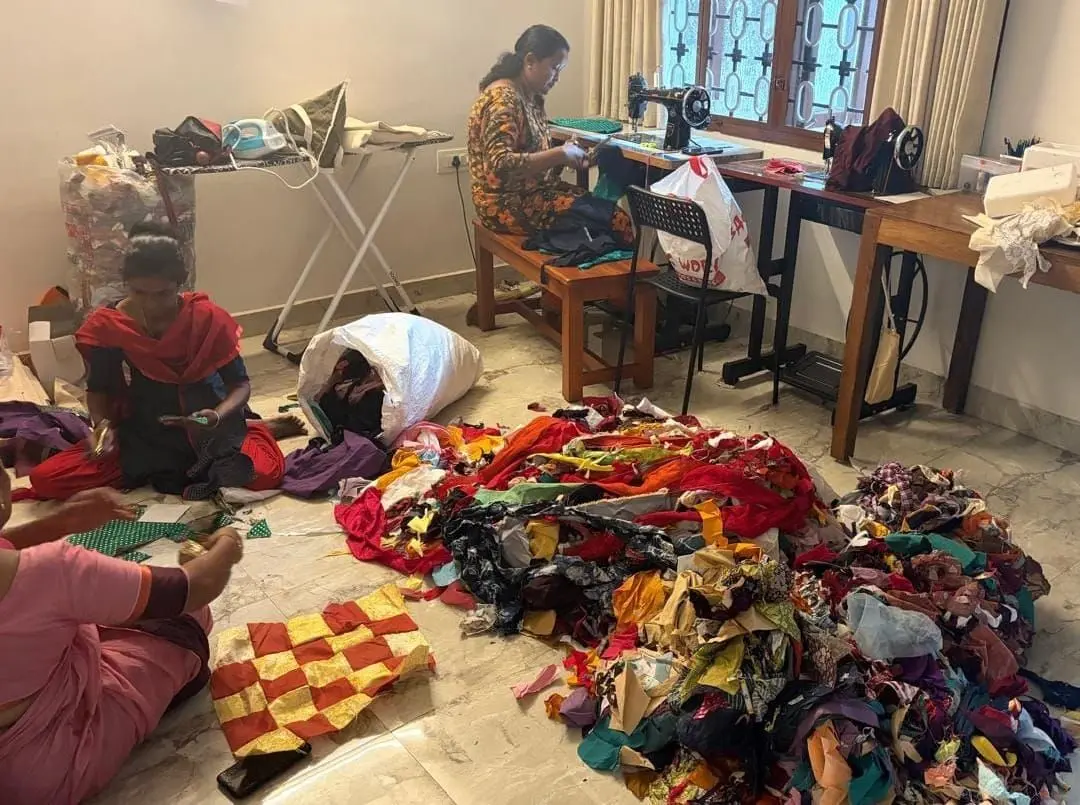 Cutting, measuring and stitching practised under the teacher