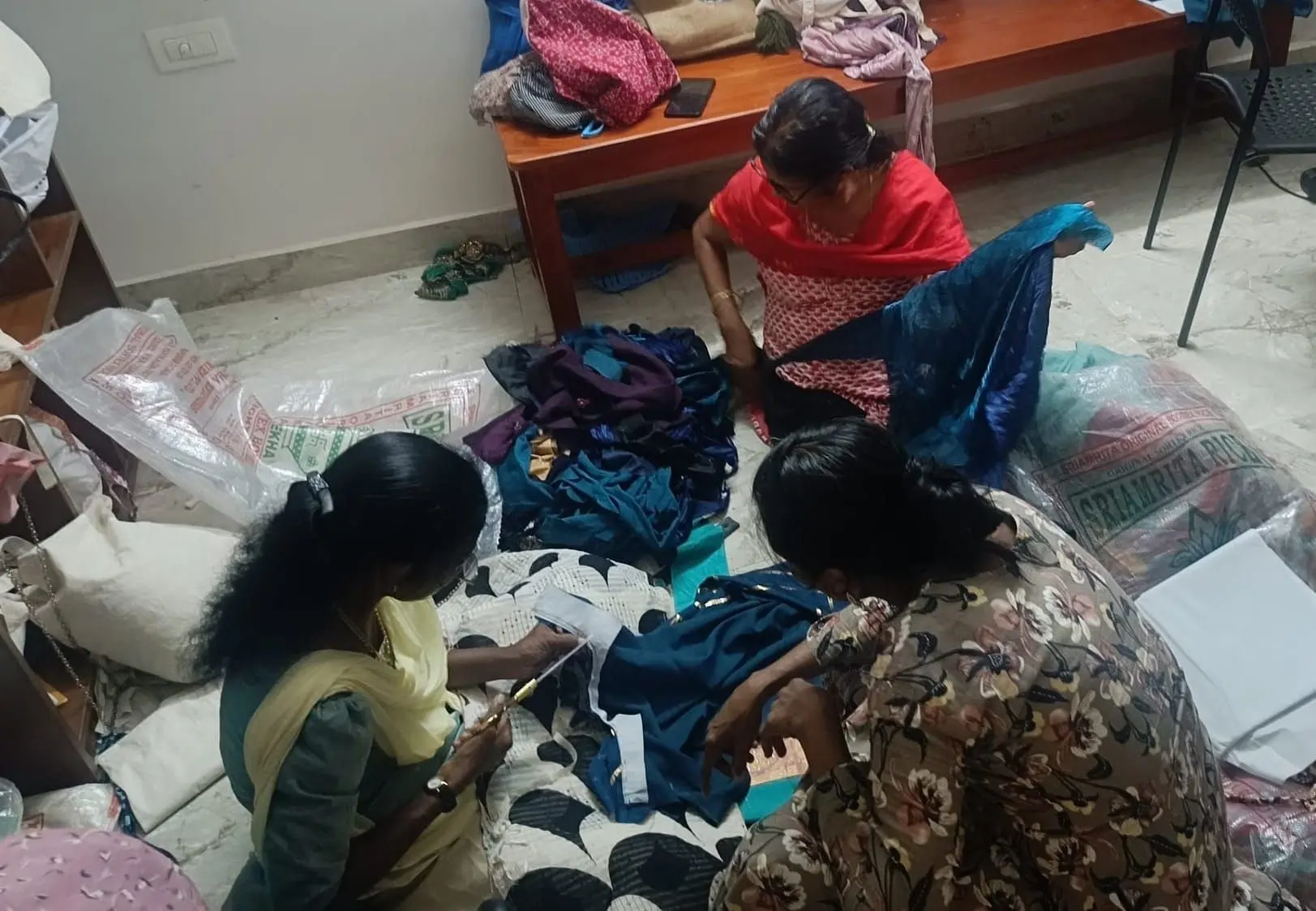 Women practised making production-quality bags from leftover fabric
