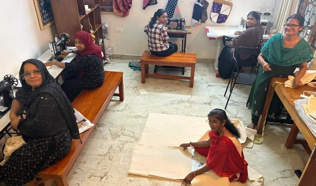Roles split across measuring, cutting, stitching and finishing