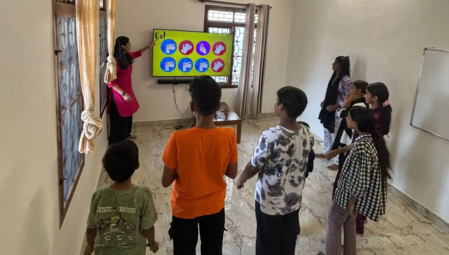 Body percussion and group games get children moving together